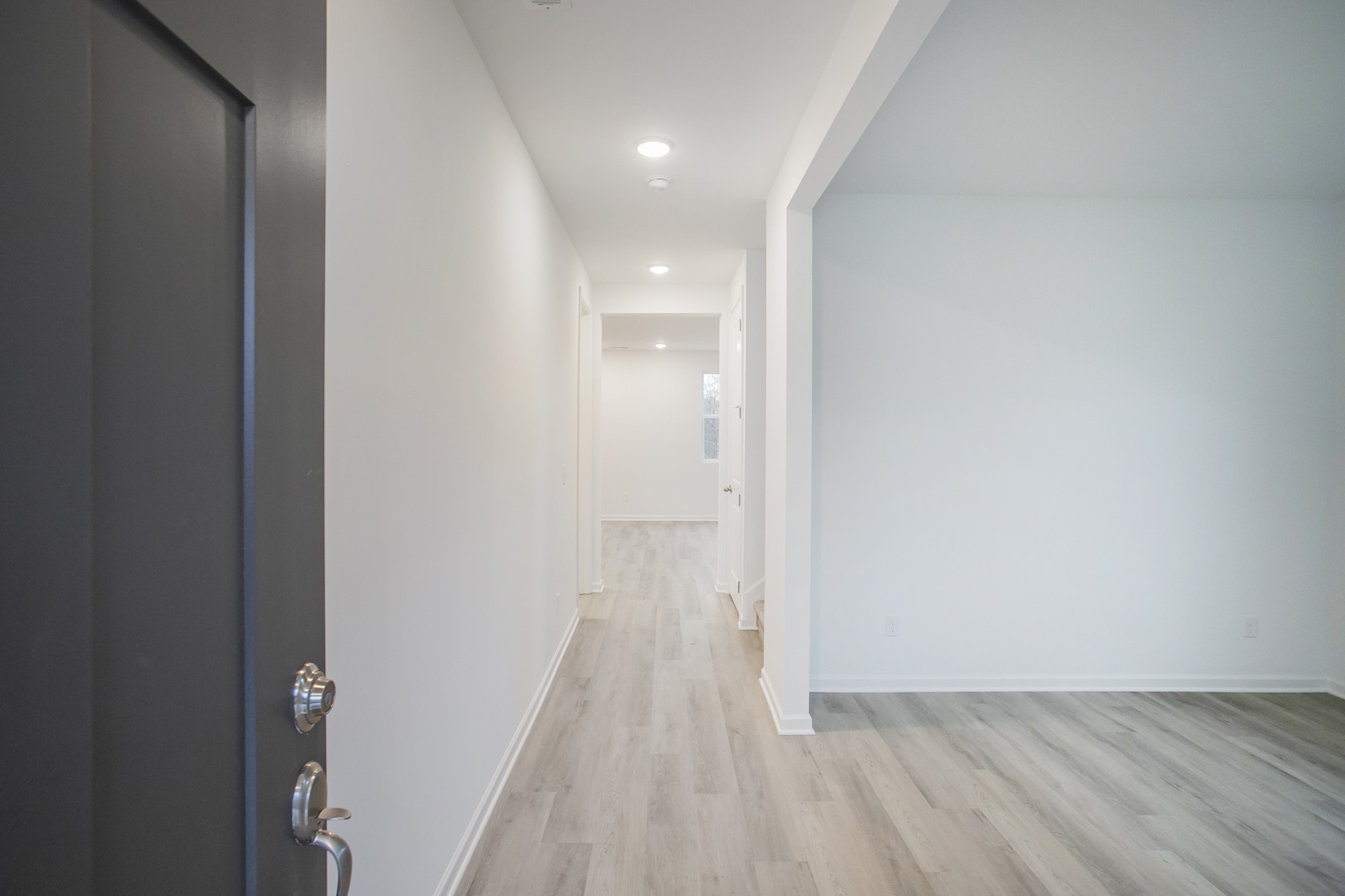 625 Maple Bend Dickson, TN 37055 - Photo 10 of 45 a view of a hallway with wooden floor