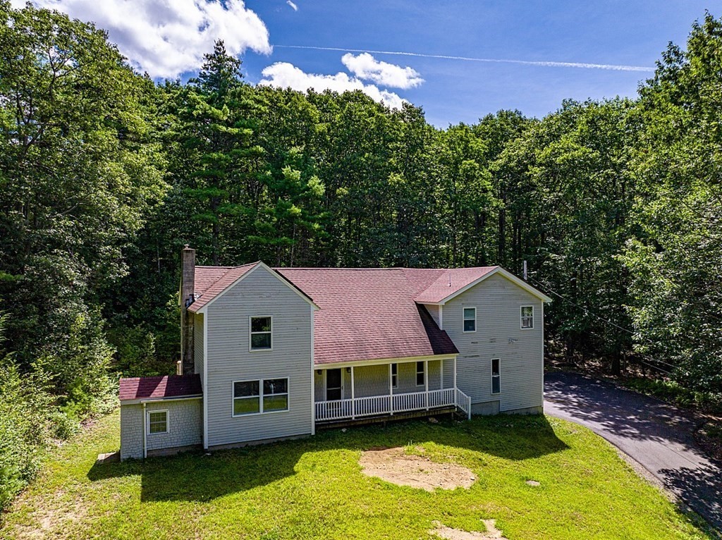 90 Minott Road Westminster, MA 01473 - Photo 1 of 41 a aerial view of a house with a yard table and chairs