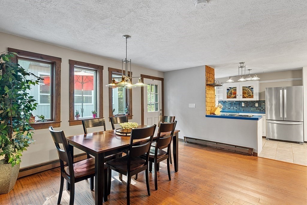 90 Minott Road Westminster, MA 01473 - Photo 11 of 41 a view of a dining room with furniture window and wooden floor