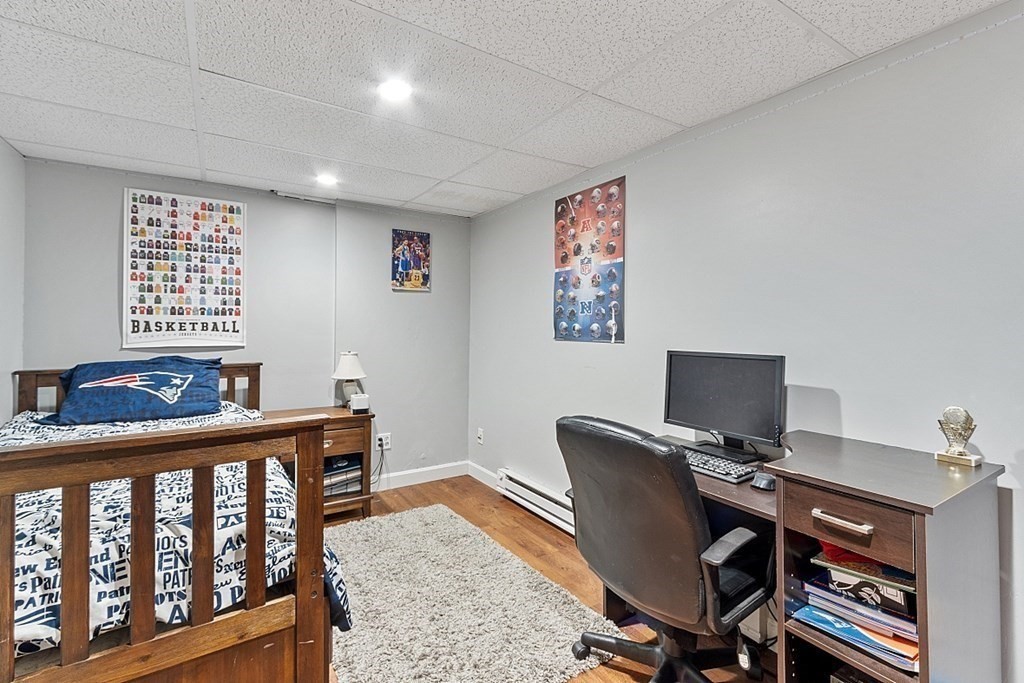 90 Minott Road Westminster, MA 01473 - Photo 28 of 41 a view of a workspace with furniture and a window