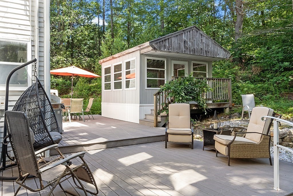 90 Minott Road Westminster, MA 01473 - Photo 3 of 41 a view of a patio with a table and chairs