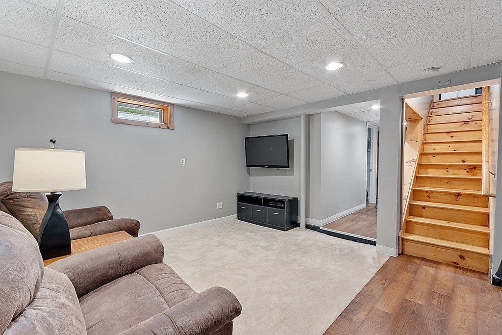 90 Minott Road Westminster, MA 01473 - Photo 32 of 41 a bedroom with a bed and a flat screen television