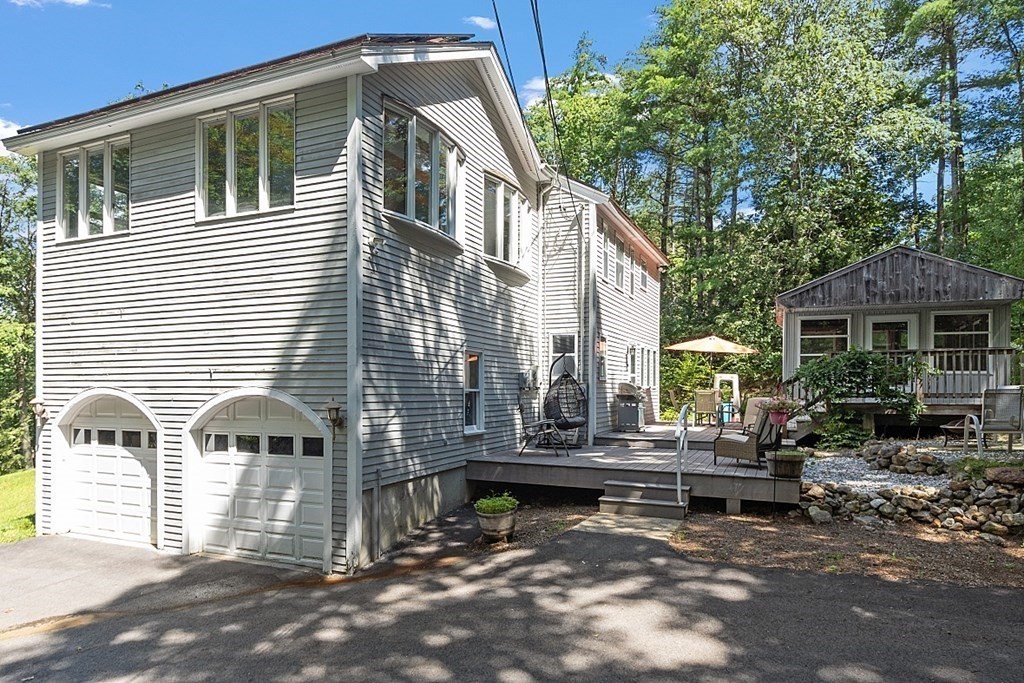 90 Minott Road Westminster, MA 01473 - Photo 35 of 41 a front view of house with yard outdoor seating and barbeque oven