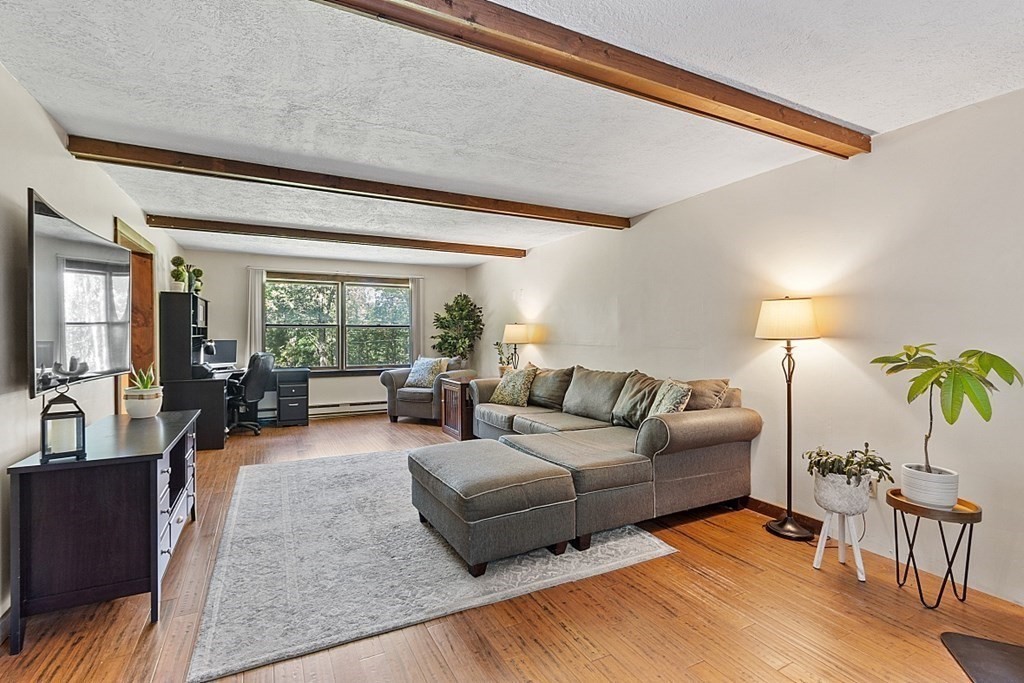 90 Minott Road Westminster, MA 01473 - Photo 6 of 41 a living room with furniture and a large window