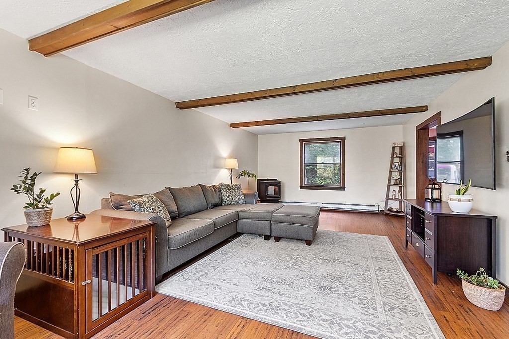 90 Minott Road Westminster, MA 01473 - Photo 7 of 41 a living room with furniture and a rug