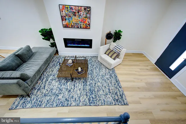 a living room with furniture and a couch