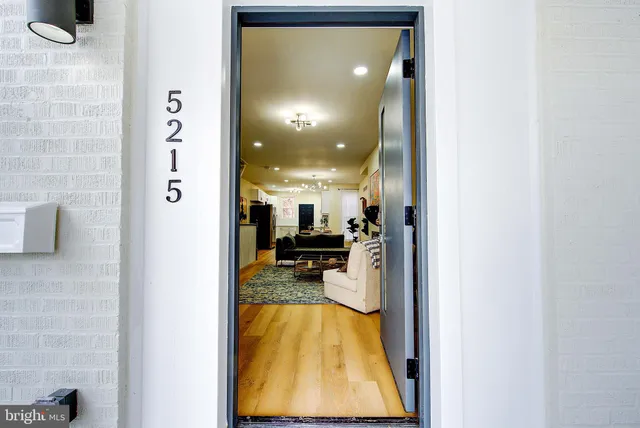 a view of a living room and bathroom