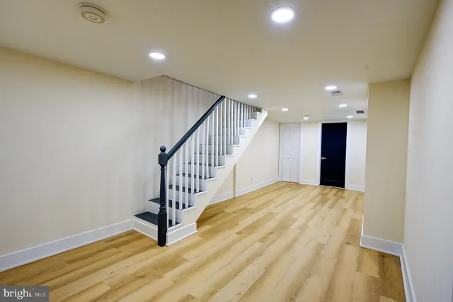 a view of entryway with wooden floor