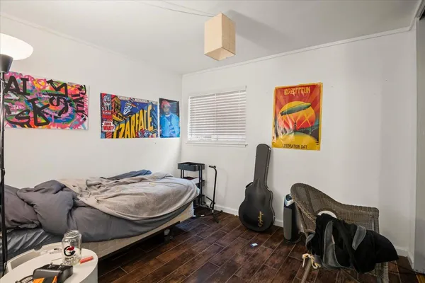 a room with furniture and a wooden floor