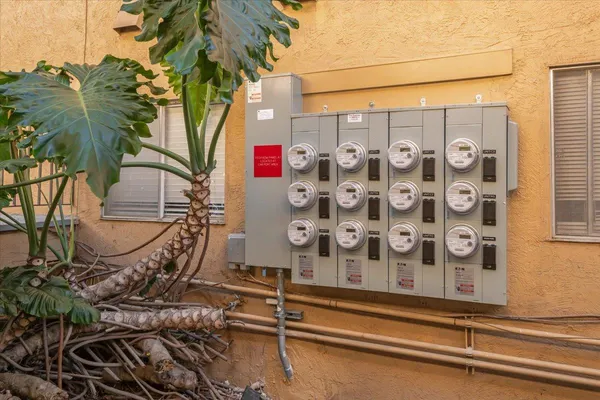 a utility room with sink dryer and washer