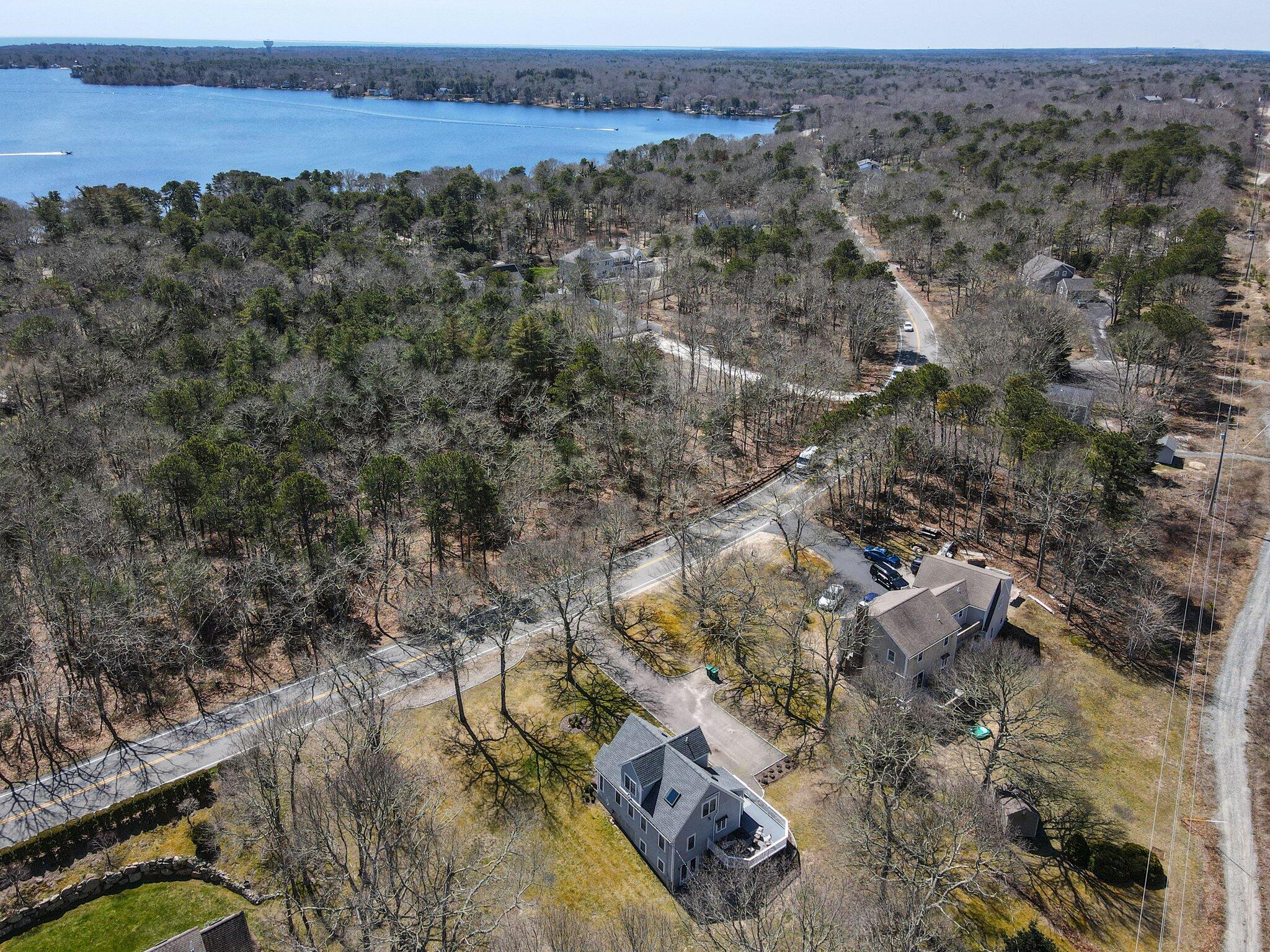 255 Shootflying Hill Road Centerville, MA 02632 - Photo 45 of 52 an aerial view of house with yard