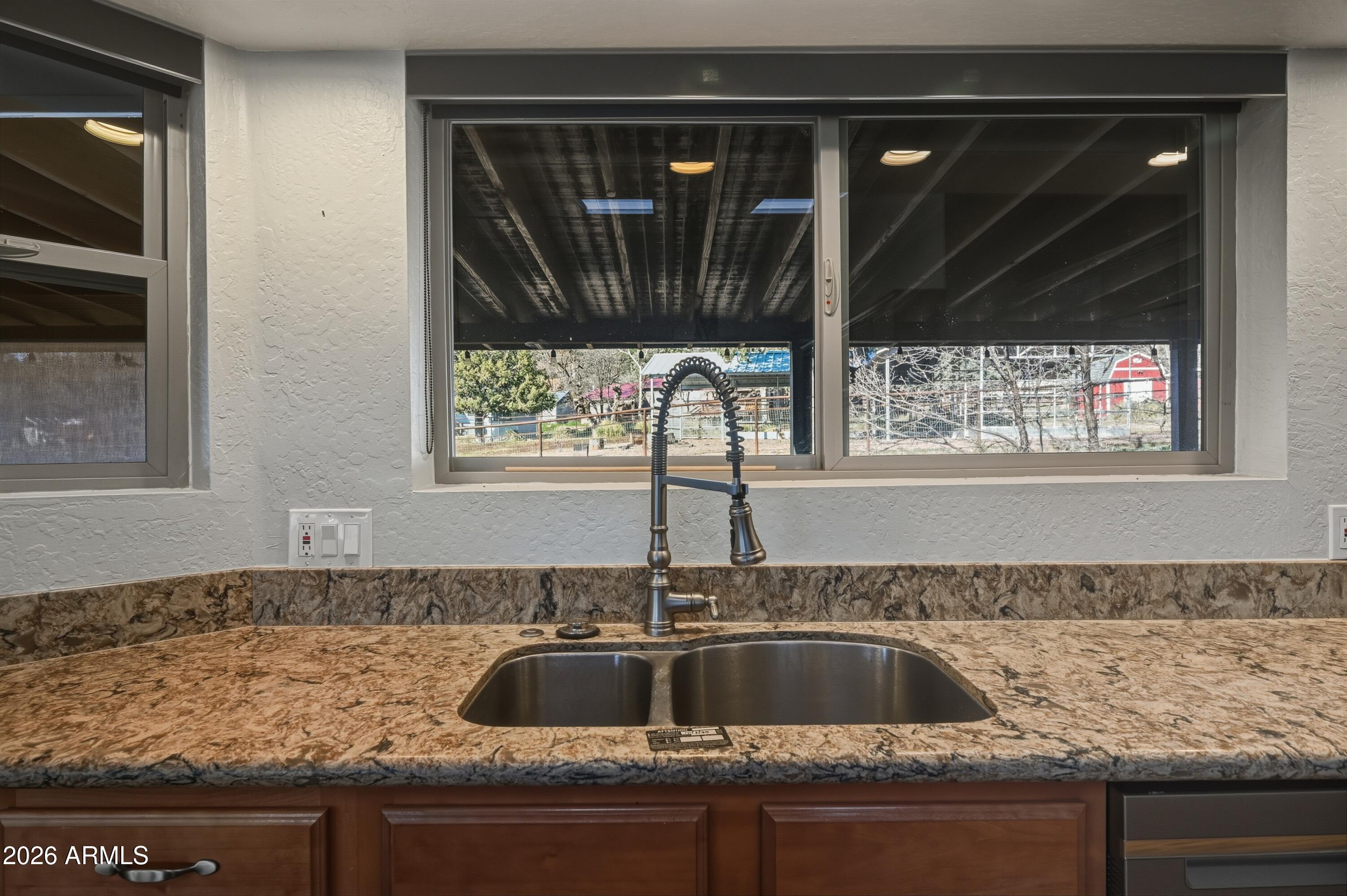 6475 Pine Cone Trail Pine, AZ 85544 - Photo 11 of 51 a kitchen with a sink and a window