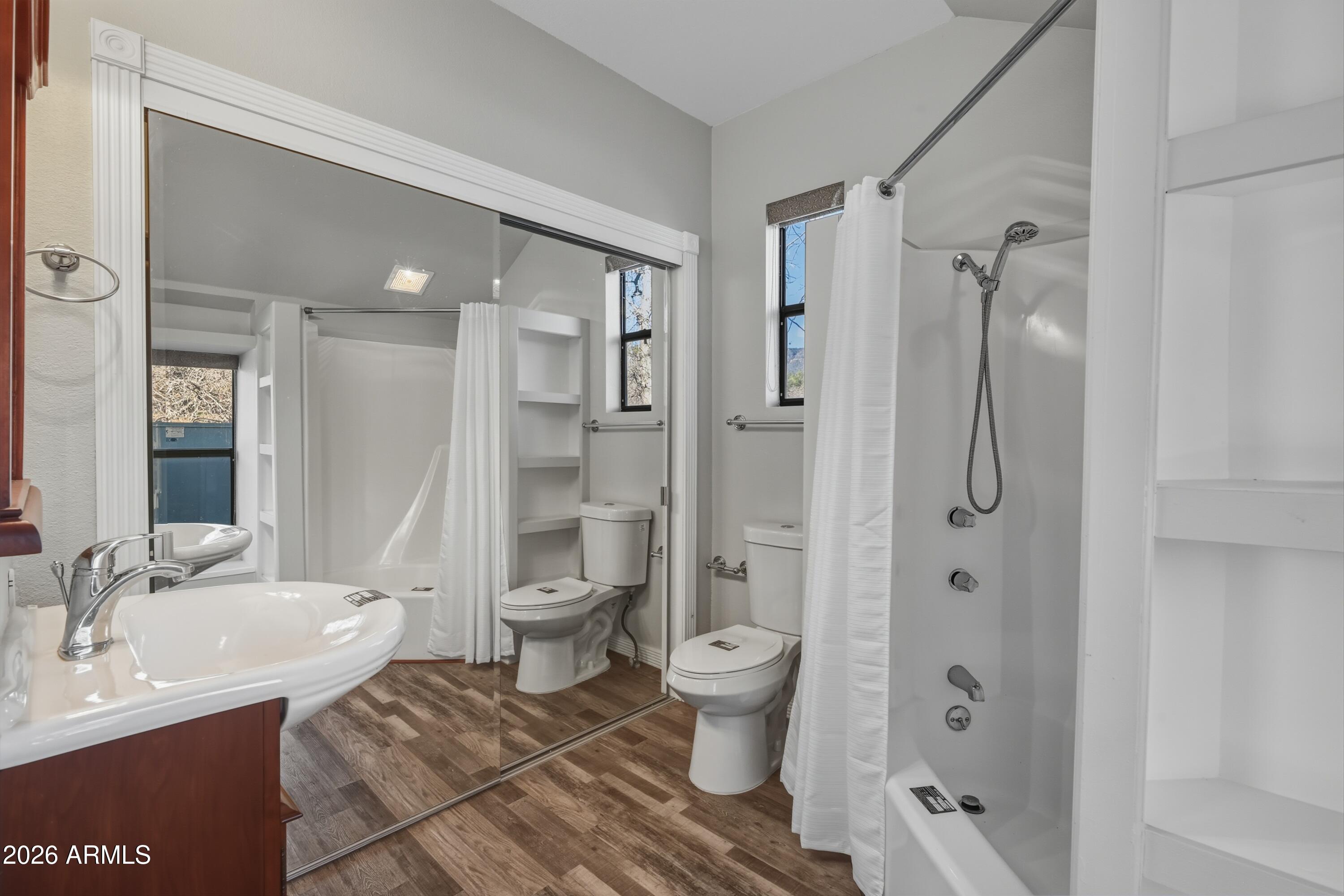 6475 Pine Cone Trail Pine, AZ 85544 - Photo 25 of 51 a bathroom with a granite countertop sink toilet and shower