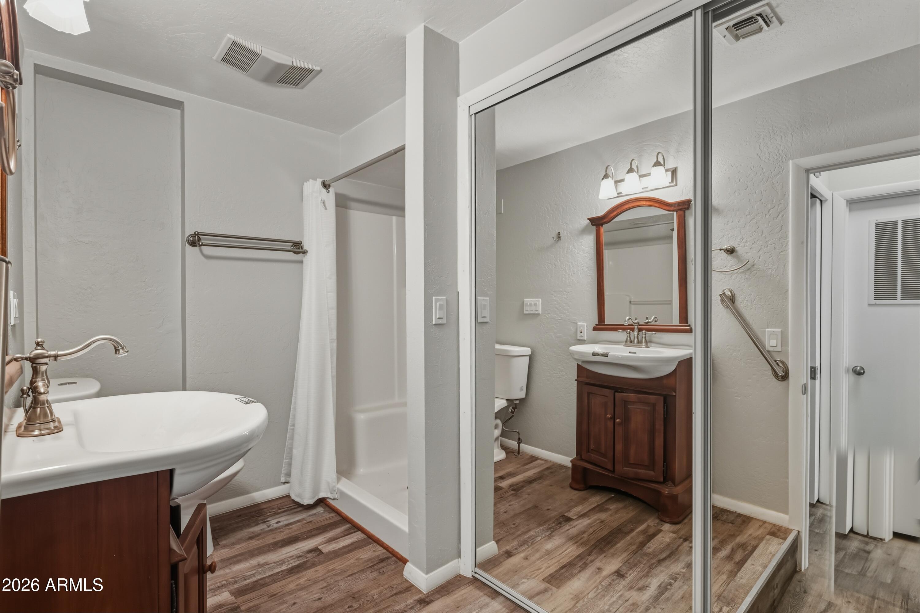 6475 Pine Cone Trail Pine, AZ 85544 - Photo 29 of 51 a bathroom with a sink and a mirror