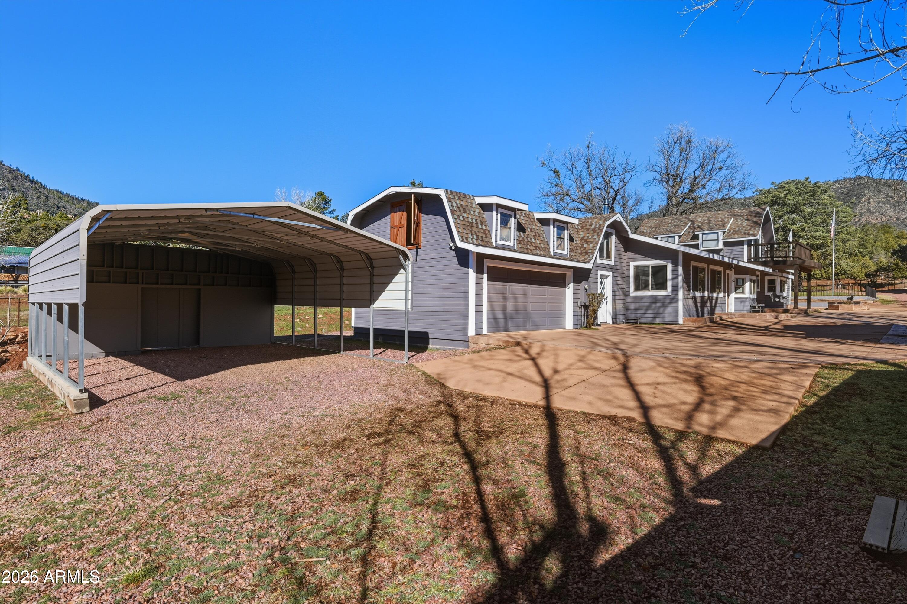 6475 Pine Cone Trail Pine, AZ 85544 - Photo 33 of 51 a front view of a house with a yard