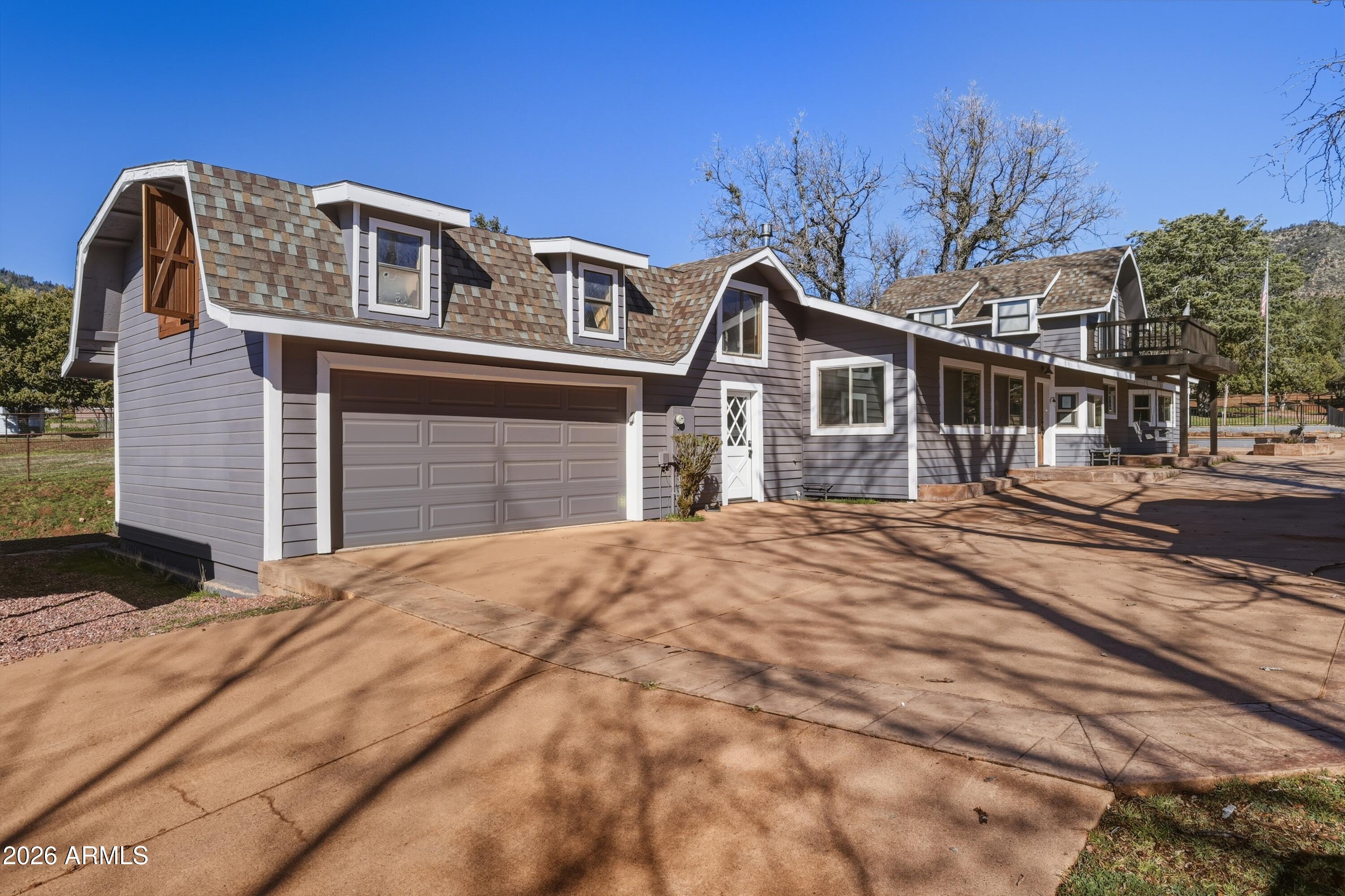 6475 Pine Cone Trail Pine, AZ 85544 - Photo 4 of 51 a front view of a house with a yard