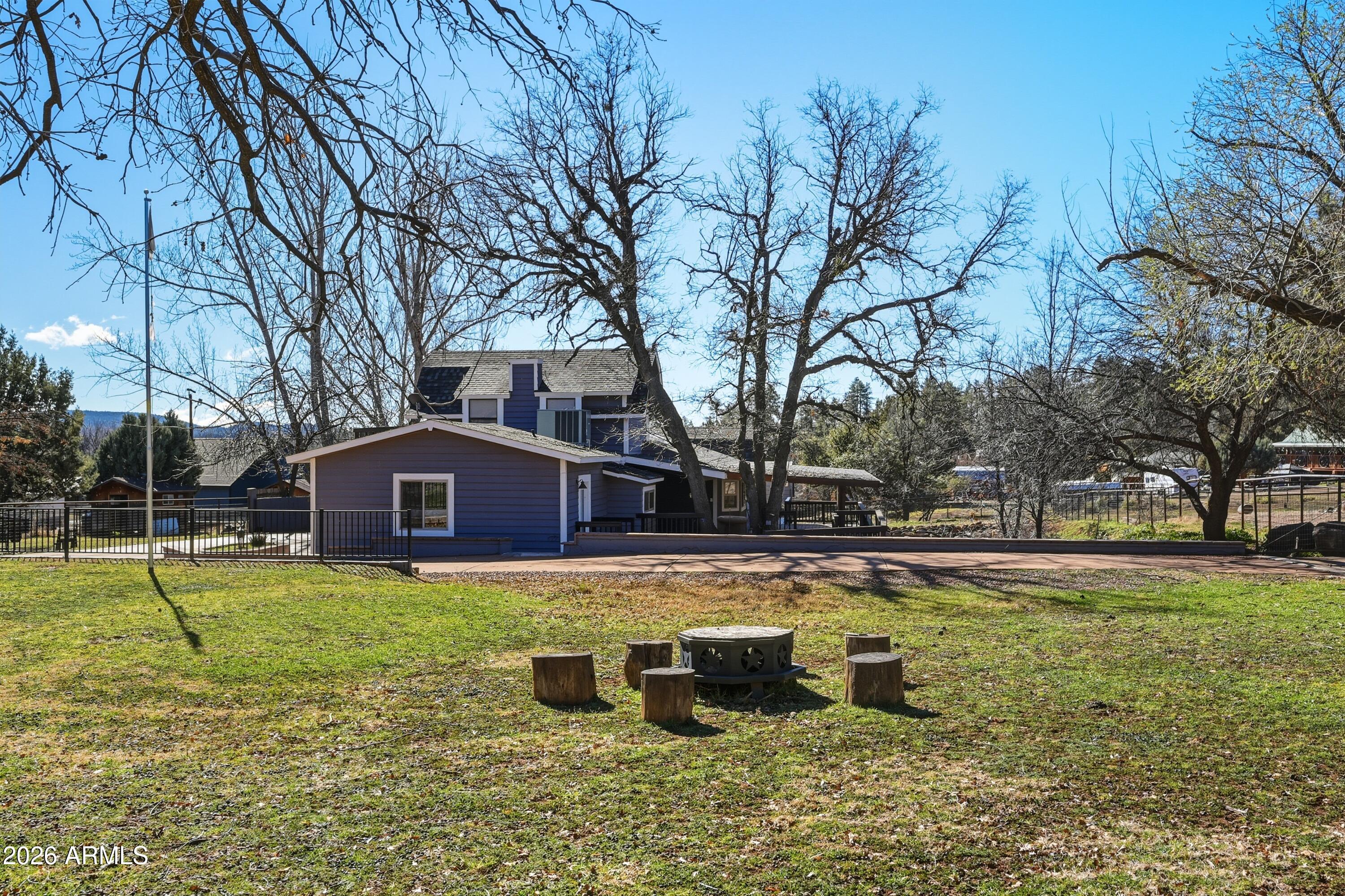 6475 Pine Cone Trail Pine, AZ 85544 - Photo 41 of 51 a view of a house with a yard