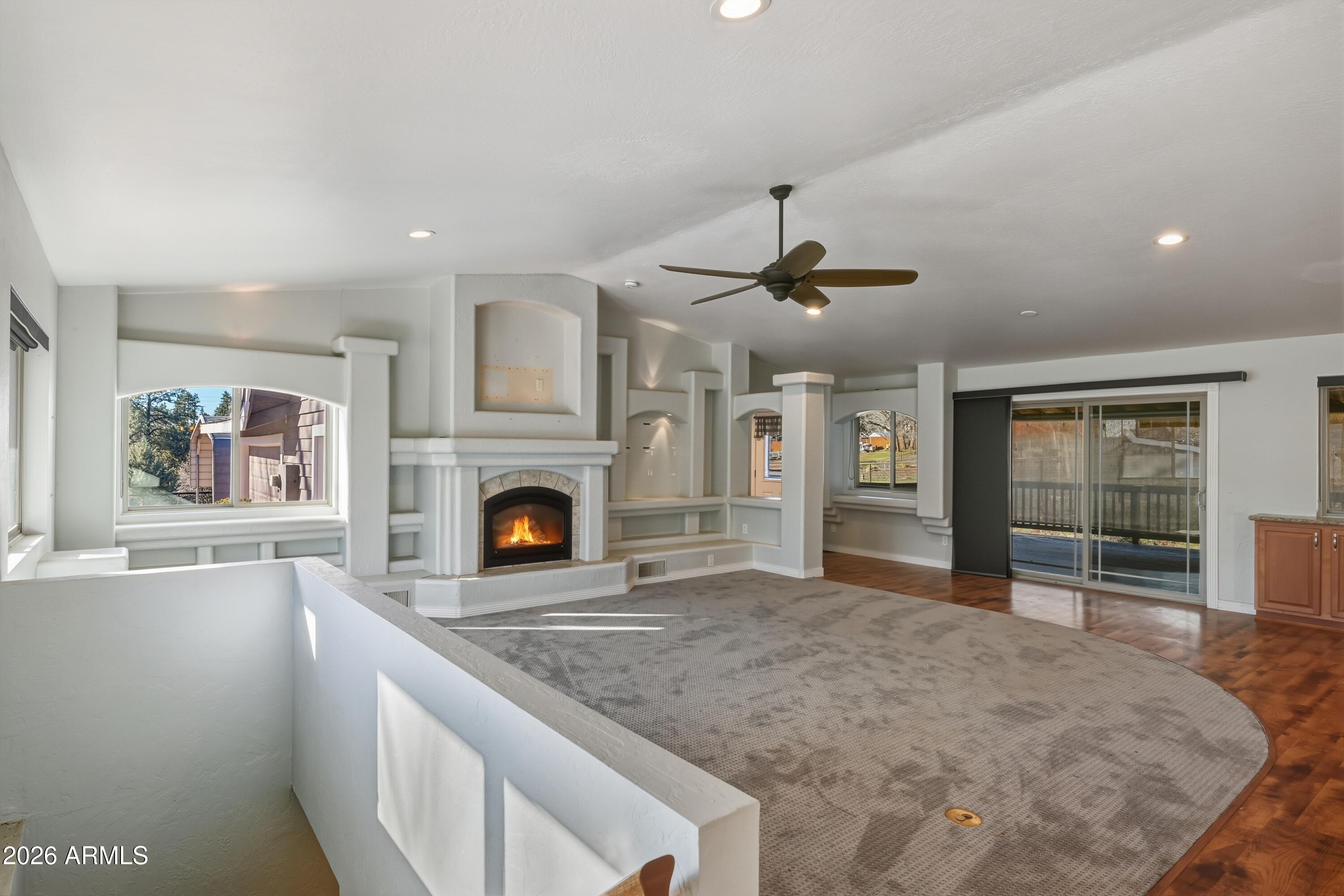 6475 Pine Cone Trail Pine, AZ 85544 - Photo 6 of 51 a view of livingroom with fireplace cabinet and window