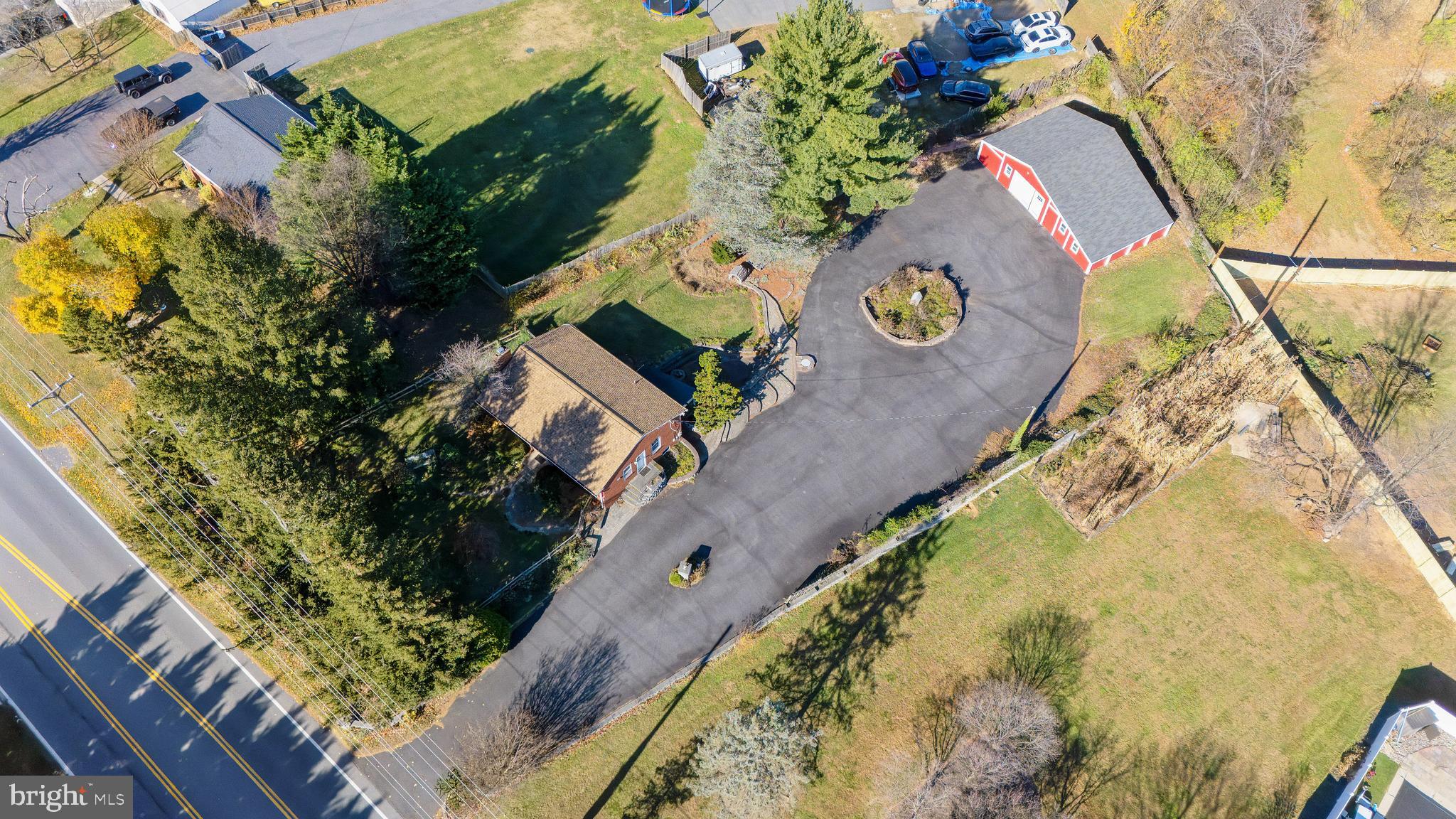 11914 Fingerboard Road Monrovia, MD 21770 - Photo 12 of 13 view of a house with a yard and sitting area