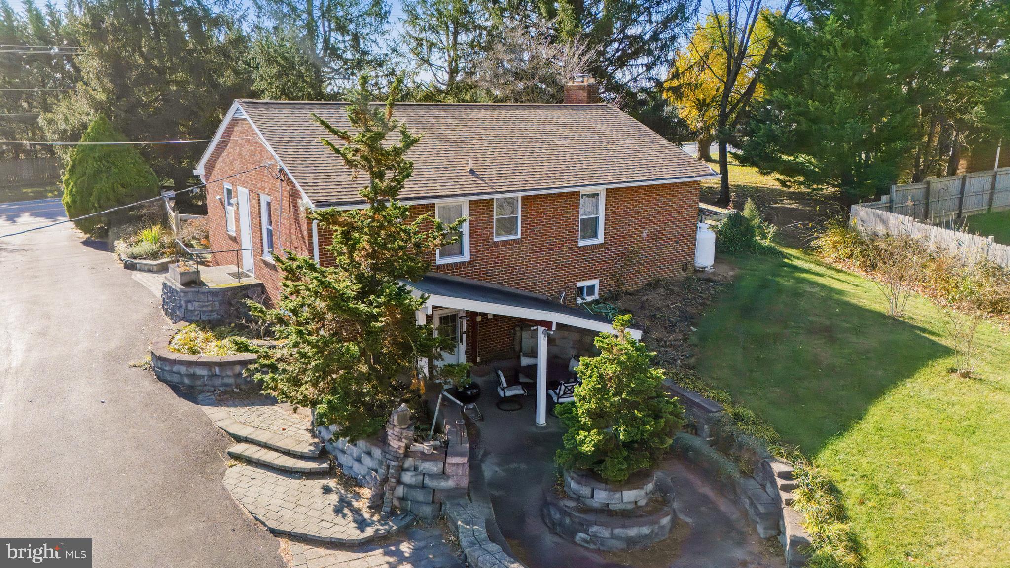 11914 Fingerboard Road Monrovia, MD 21770 - Photo 7 of 13 a aerial view of a house with swimming pool and garden