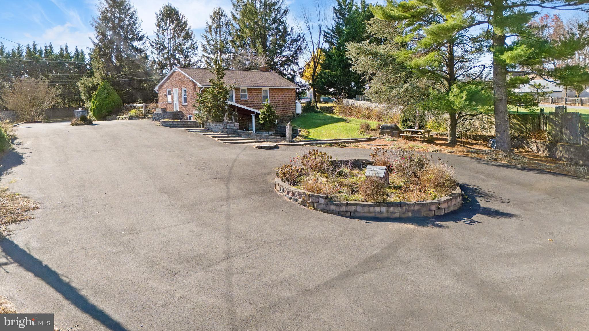 11914 Fingerboard Road Monrovia, MD 21770 - Photo 9 of 13 a view of a house with swimming pool and a yard