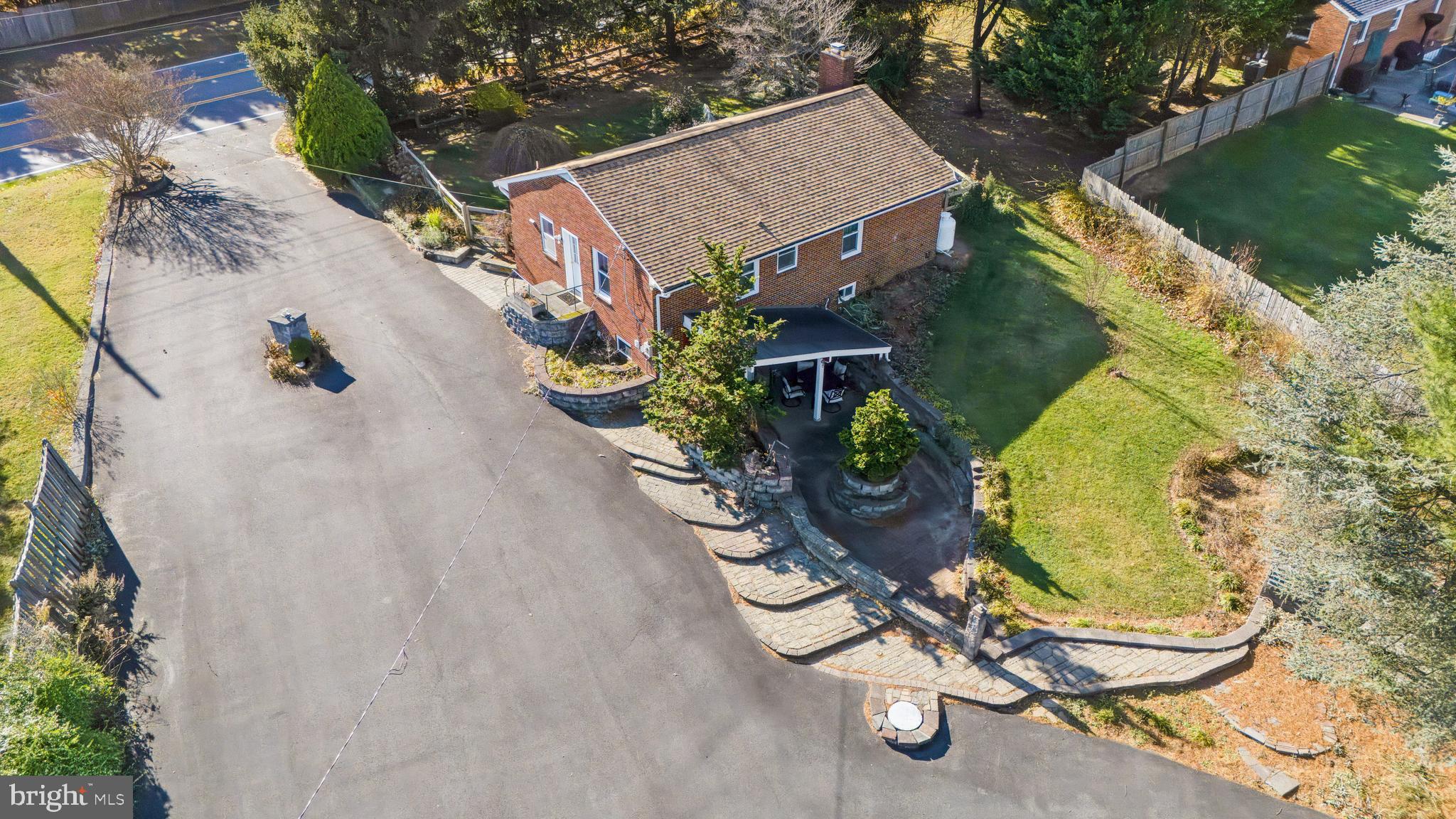 11914 Fingerboard Road Monrovia, MD 21770 - Photo 10 of 13 an aerial view of a house with swimming pool and porch