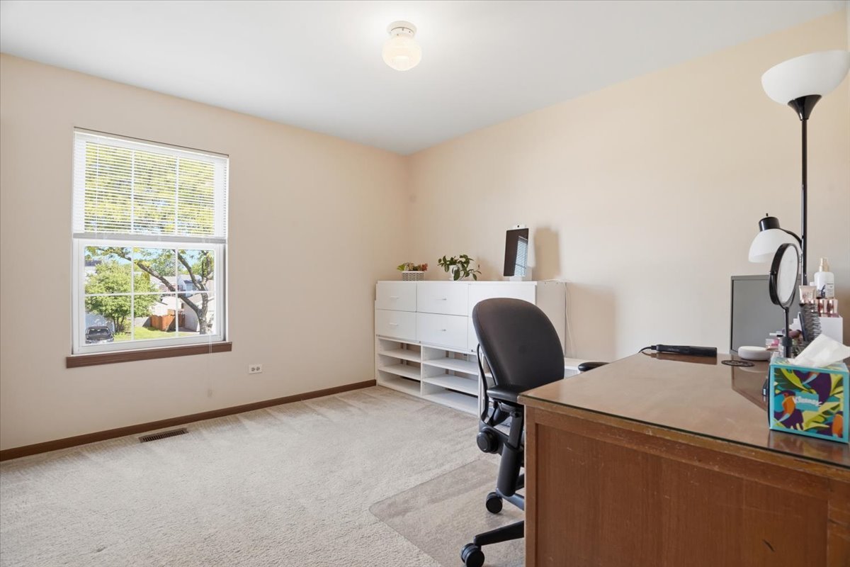 3413 Harbor Ridge Drive Zion, IL 60099 - Photo 23 of 37 a workspace with furniture and window