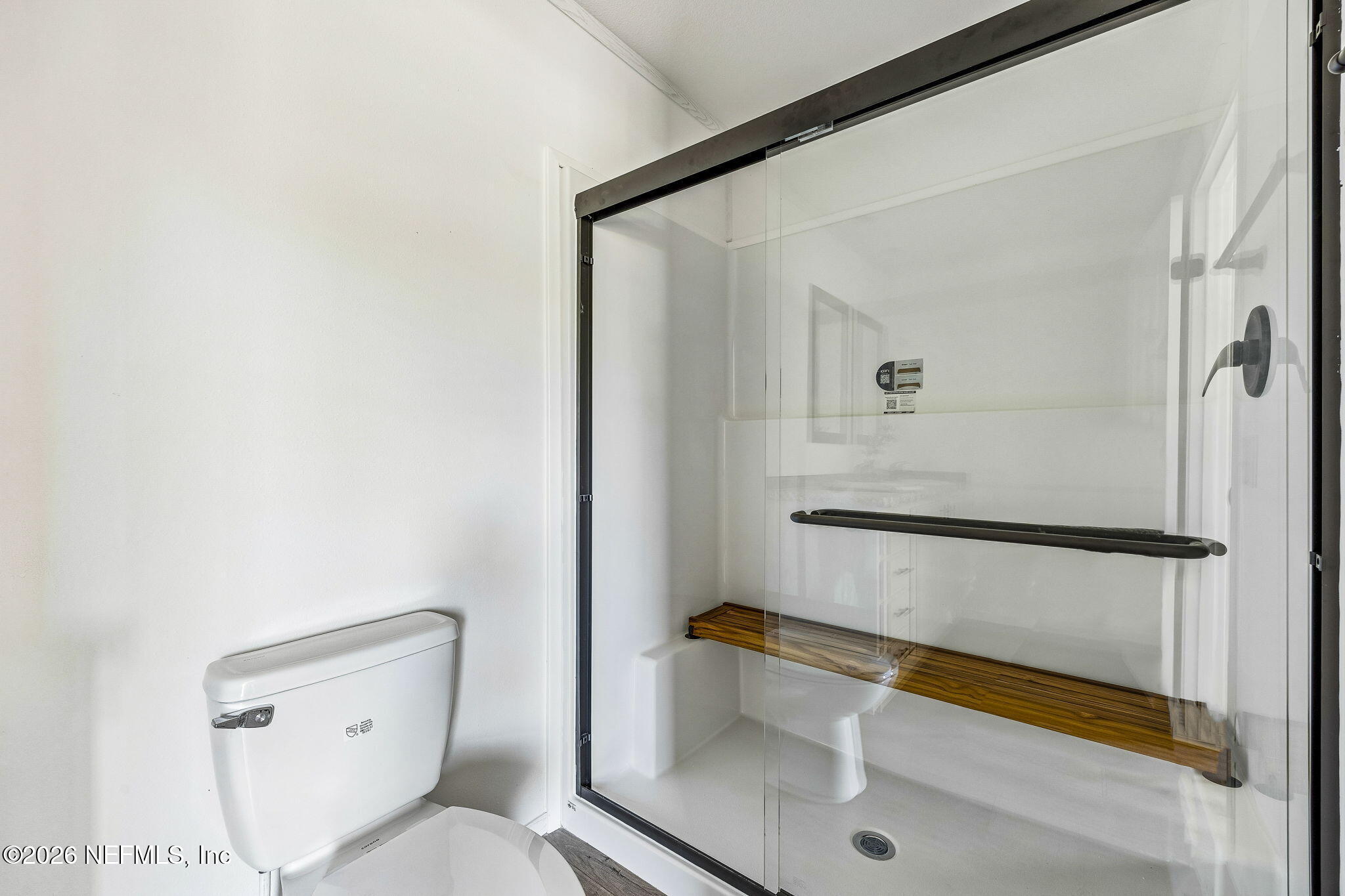 27450 West 3rd Avenue Hilliard, FL 32046 - Photo 15 of 24 a bathroom with a toilet and a shower