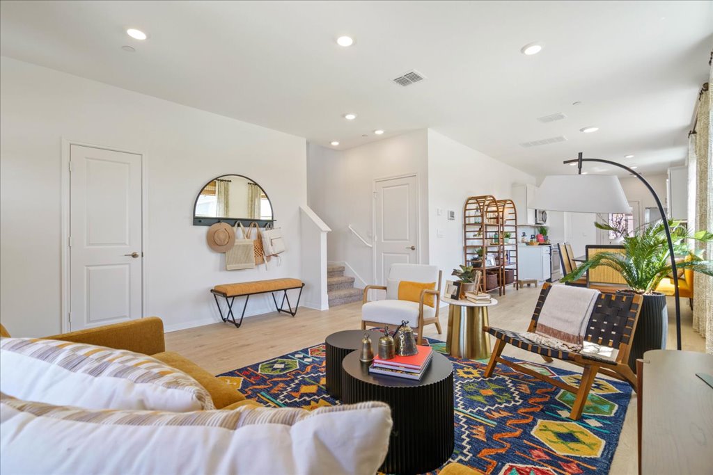 2534 Caleb Asher Loop Round Rock, TX 78665 - Photo 2 of 40 a living room with furniture and a wooden floor