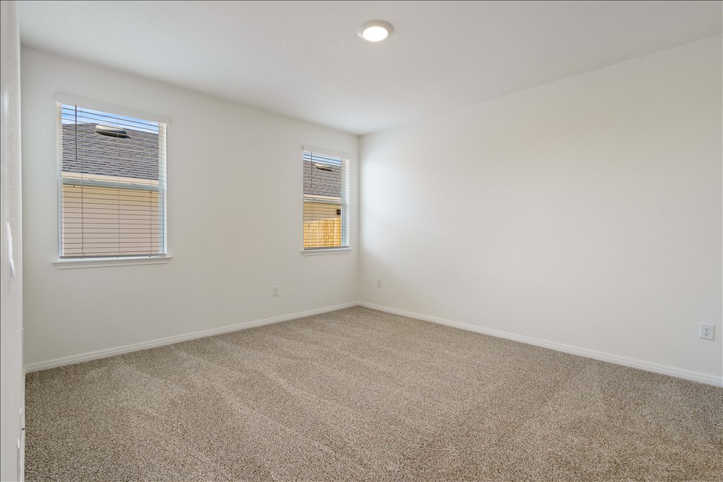2534 Caleb Asher Loop Round Rock, TX 78665 - Photo 33 of 40 an empty room with windows