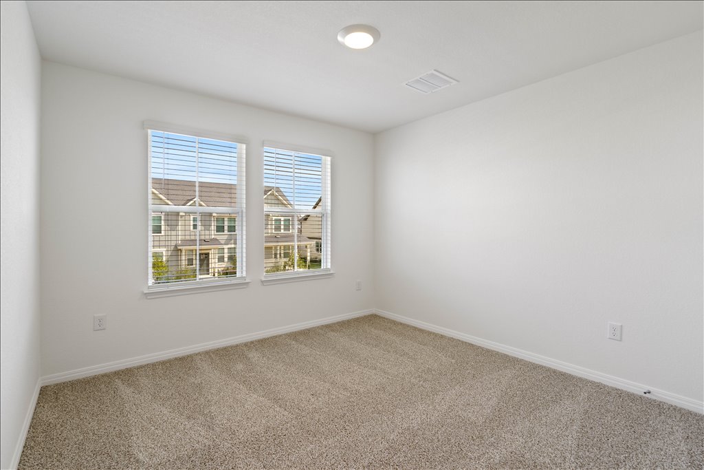 2534 Caleb Asher Loop Round Rock, TX 78665 - Photo 35 of 40 an empty room with a window