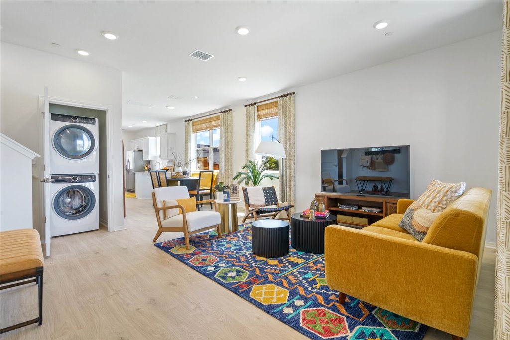 2534 Caleb Asher Loop Round Rock, TX 78665 - Photo 6 of 40 a living room with furniture and a flat screen tv