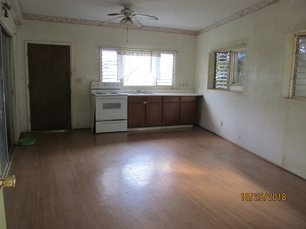 4938 Laipo Road Kapaa, HI 96746 - Photo 2 of 10 wooden floor in an empty room with a window