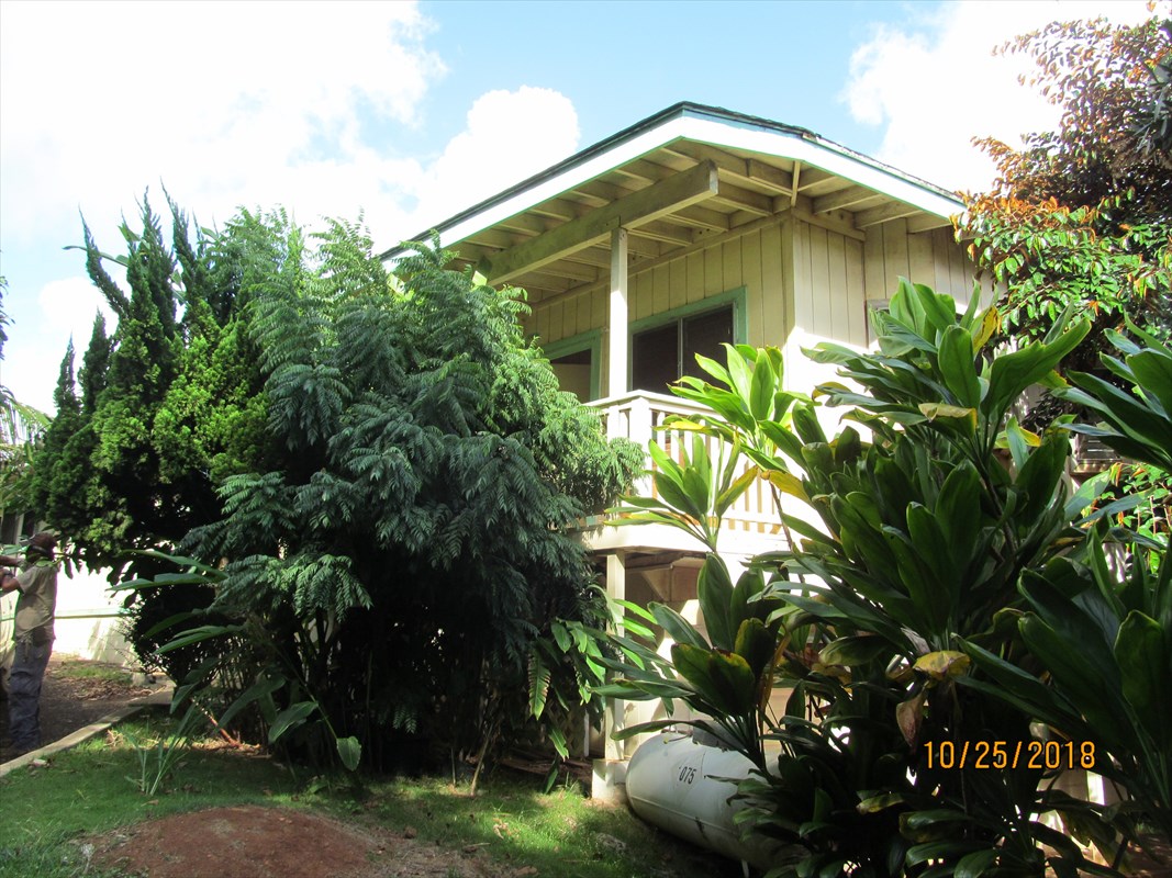 4938 Laipo Road Kapaa, HI 96746 - Photo 6 of 10 a front view of a house with a yard