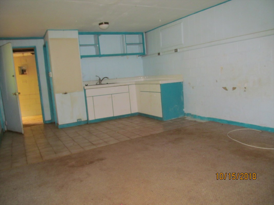 4938 Laipo Road Kapaa, HI 96746 - Photo 10 of 10 an empty room with a kitchen