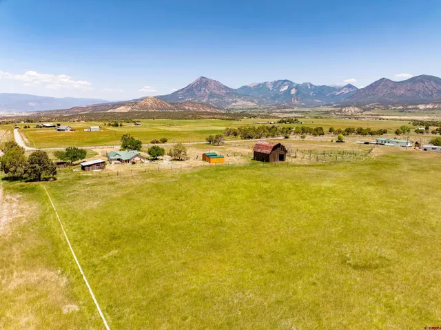 a view of an ocean and a mountain