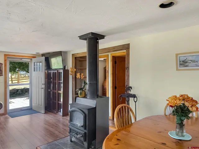 a bedroom with a bed and a table