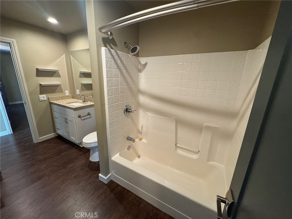 23843 Hayes Avenue, Unit ADU Murrieta, CA 92562 - Photo 11 of 24 a bathroom with a tub shower vanity and a sink