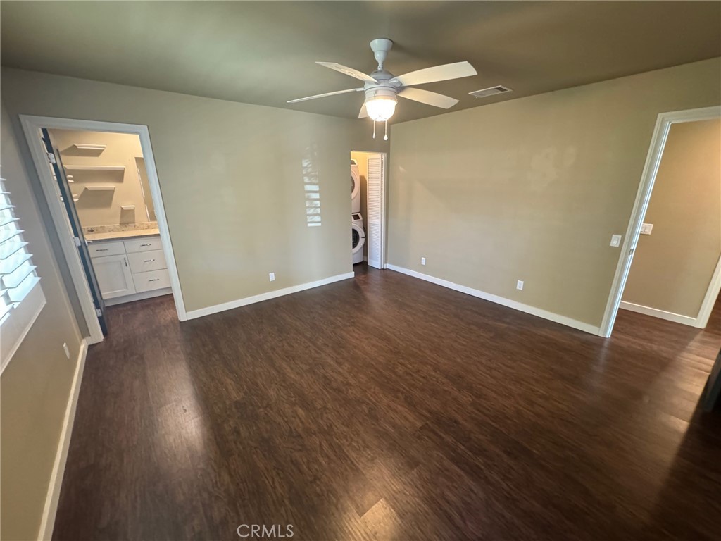 23843 Hayes Avenue, Unit ADU Murrieta, CA 92562 - Photo 16 of 24 an empty room with wooden floor and windows