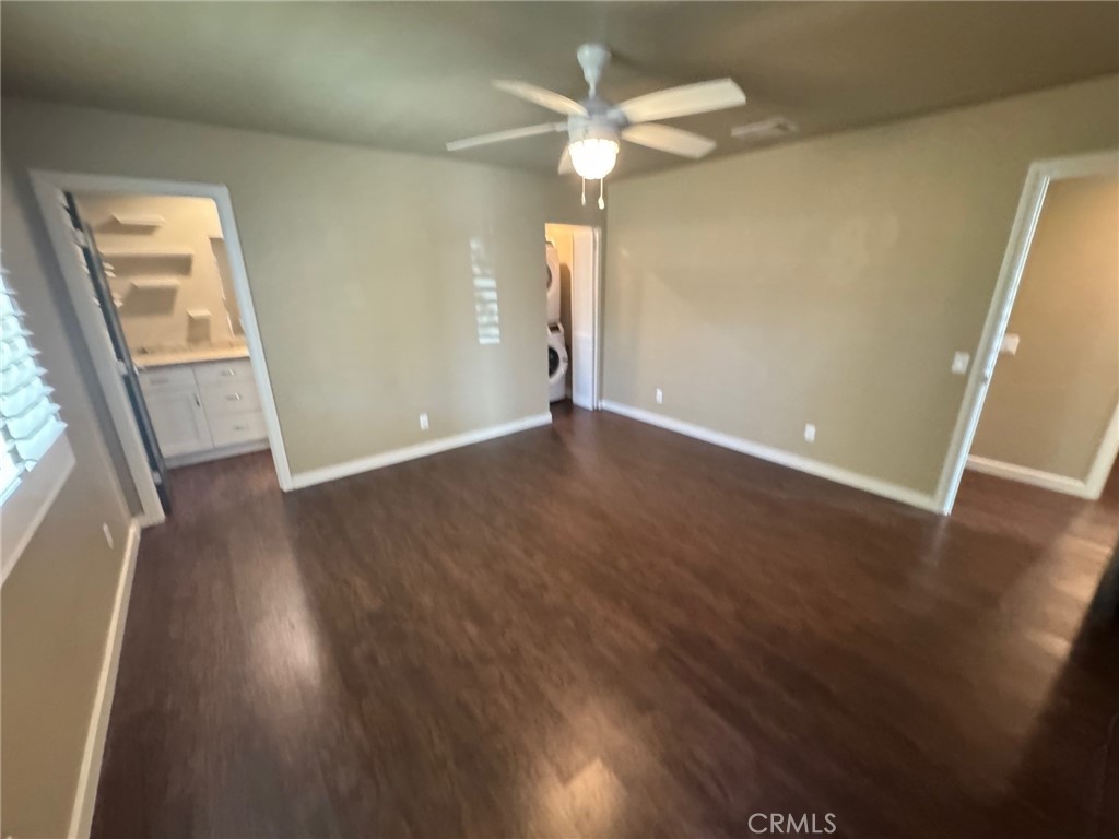 23843 Hayes Avenue, Unit ADU Murrieta, CA 92562 - Photo 17 of 24 an empty room with wooden floor fan and window
