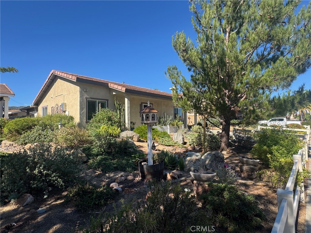 23843 Hayes Avenue, Unit ADU Murrieta, CA 92562 - Photo 2 of 24 a front view of a house with a yard