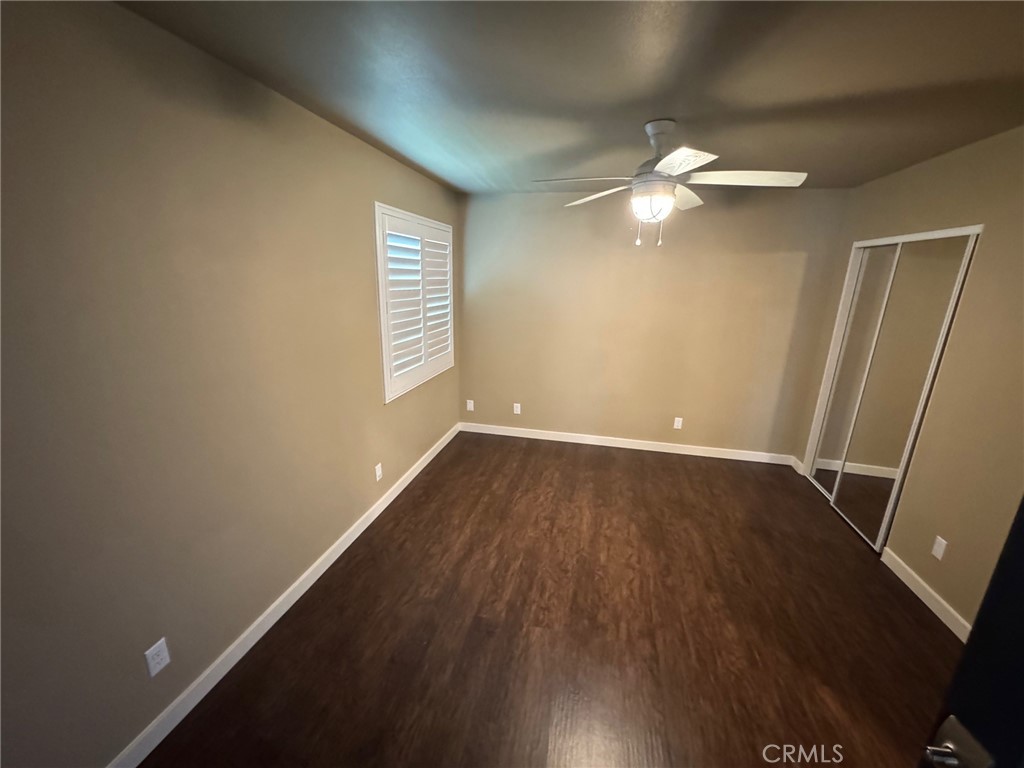23843 Hayes Avenue, Unit ADU Murrieta, CA 92562 - Photo 10 of 24 a view of empty room with wooden floor and fan