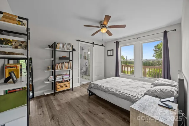 a bedroom with a bed furniture and a window