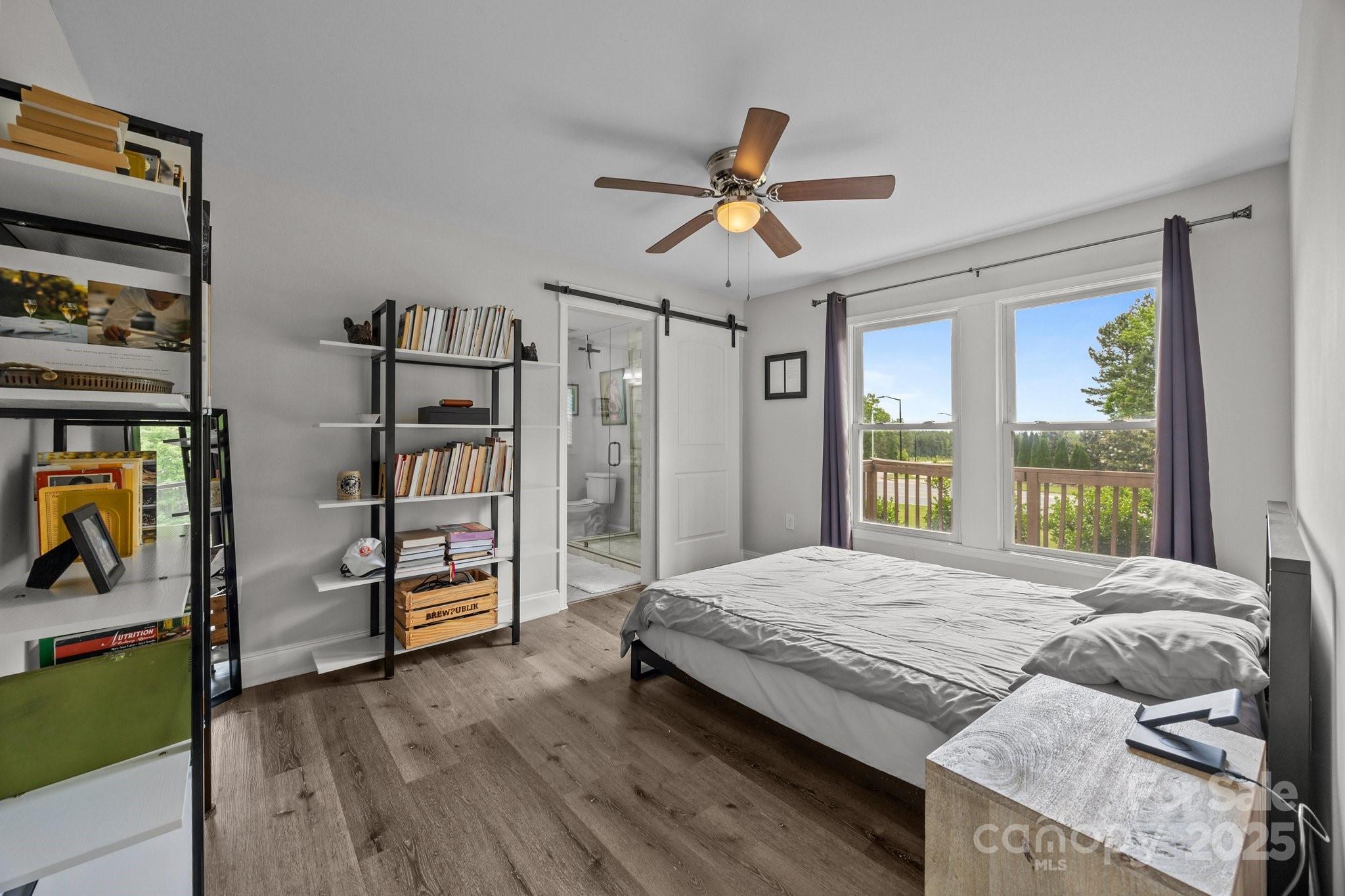 5371 Davidson Road Davidson, NC 28036 - Photo 13 of 27 a bedroom with a bed furniture and a window