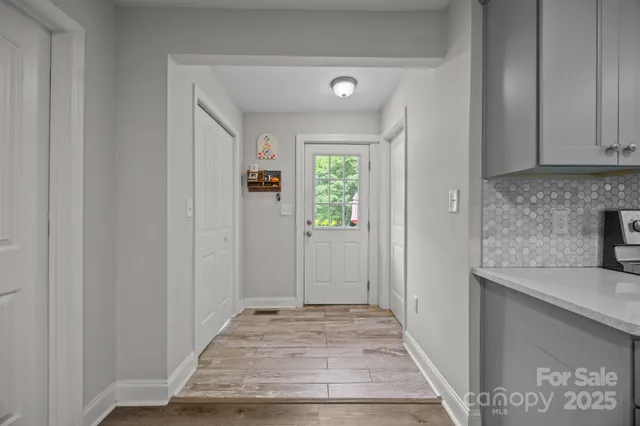 a view of an entryway with kitchen island