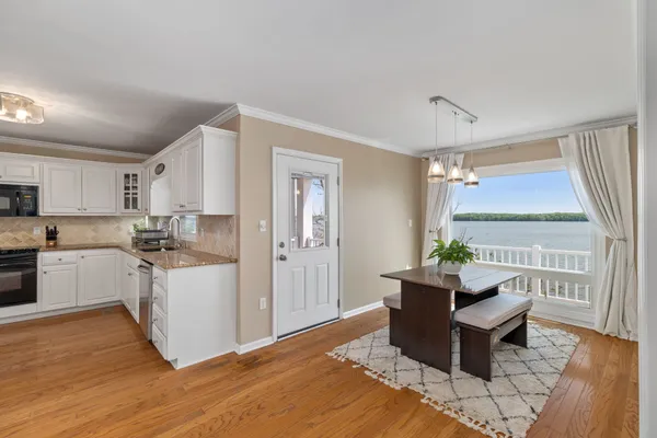 a living room with a couch and a large window