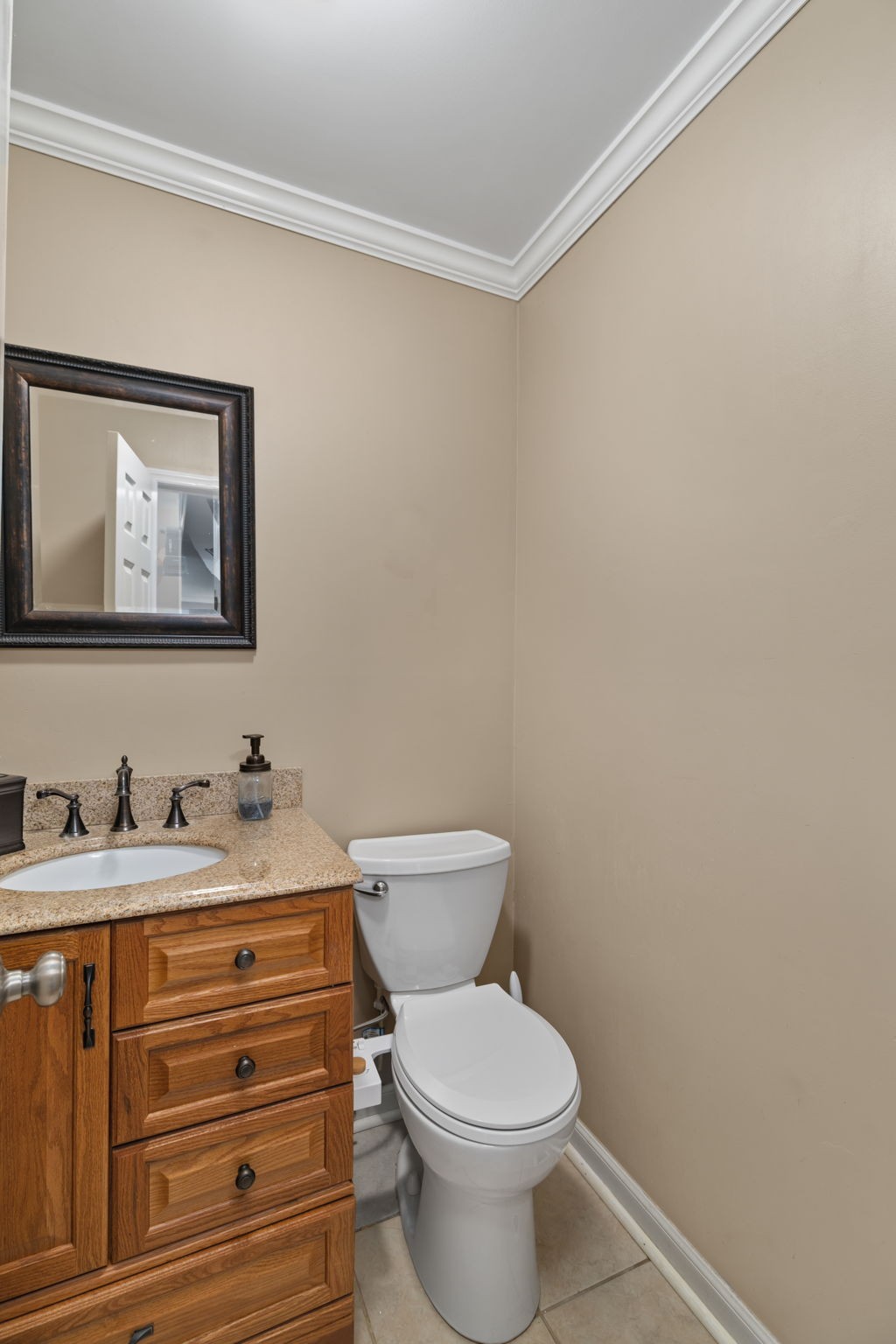 920 County Road 33 Killen, AL 35645 - Photo 23 of 80 a bathroom with a toilet sink and mirror