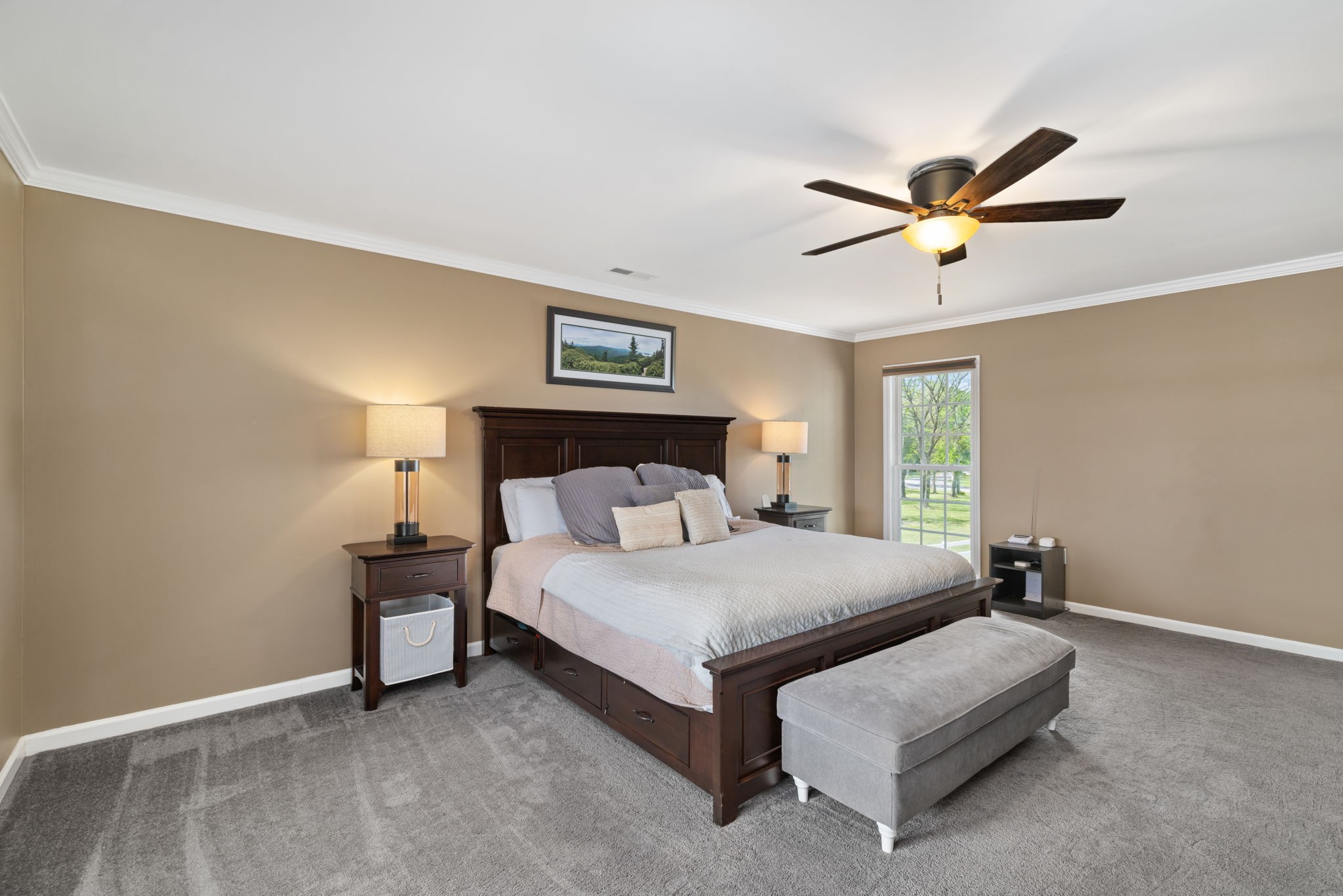 920 County Road 33 Killen, AL 35645 - Photo 26 of 80 a bedroom with a bed lamp and a window