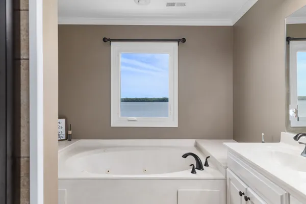 a room with furniture and pool table