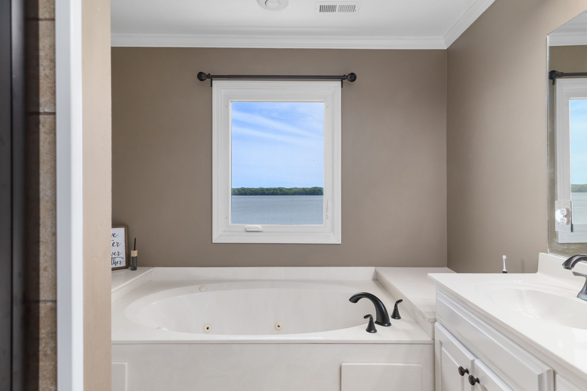 920 County Road 33 Killen, AL 35645 - Photo 28 of 80 a bathroom with a bathtub and a sink